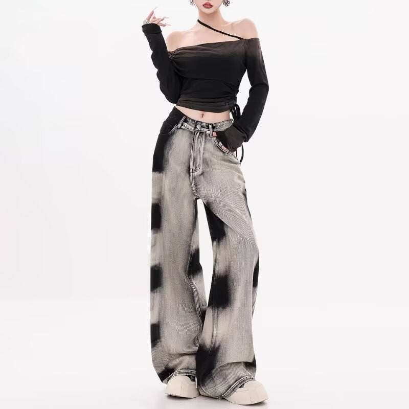 Woman wearing retro gradient tie-dyed straight-leg jeans in black cotton with micro elasticity and washed effect